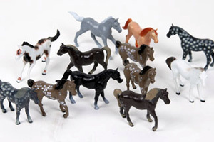12 pk of Plastic Play Horses